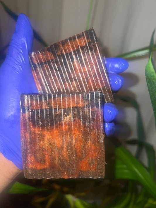 black cardamom and cream scented, coffee infused soap bar. Bronze and copper colored soap.